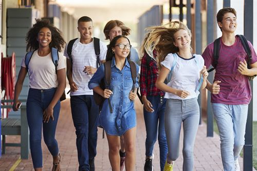 Students walking down a hallway